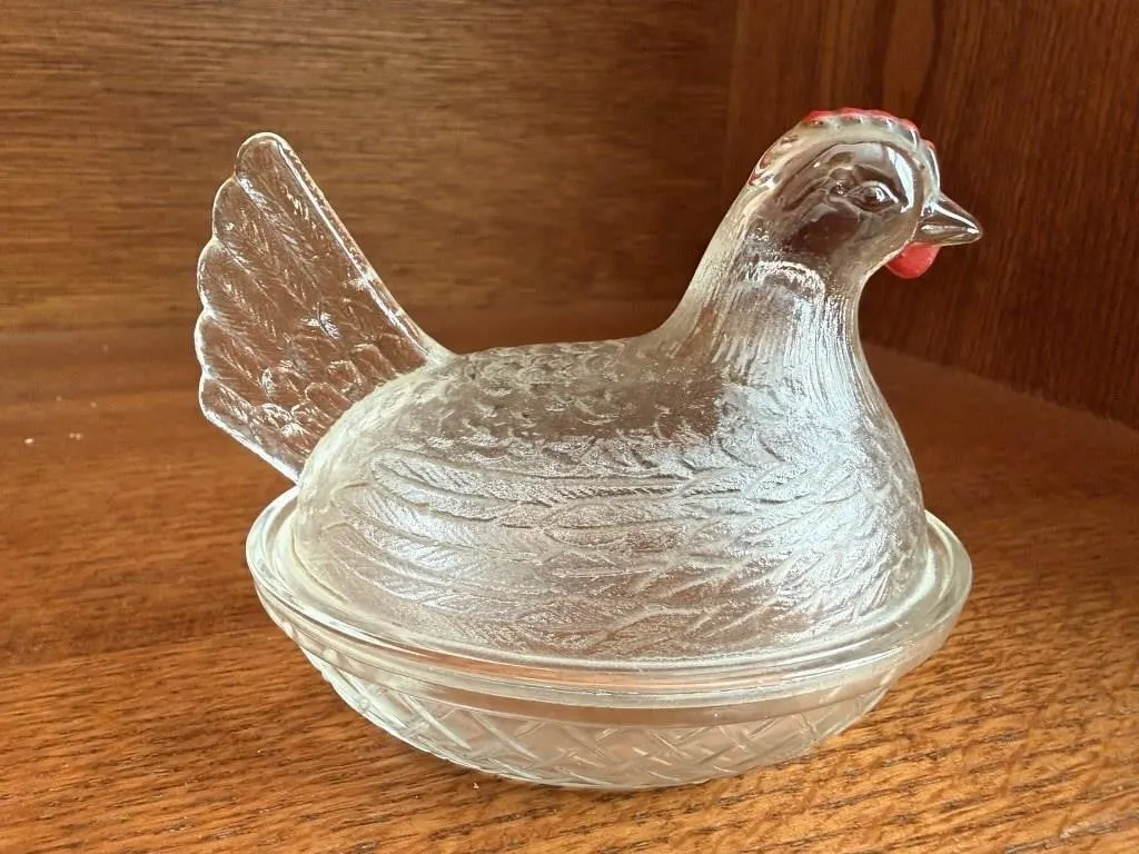 Clear glass hen on nest