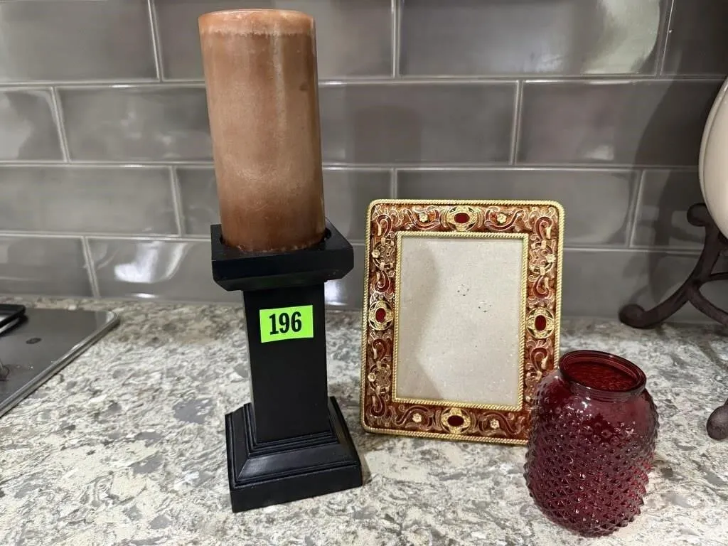 Picture frame, pillar candle, red glassware