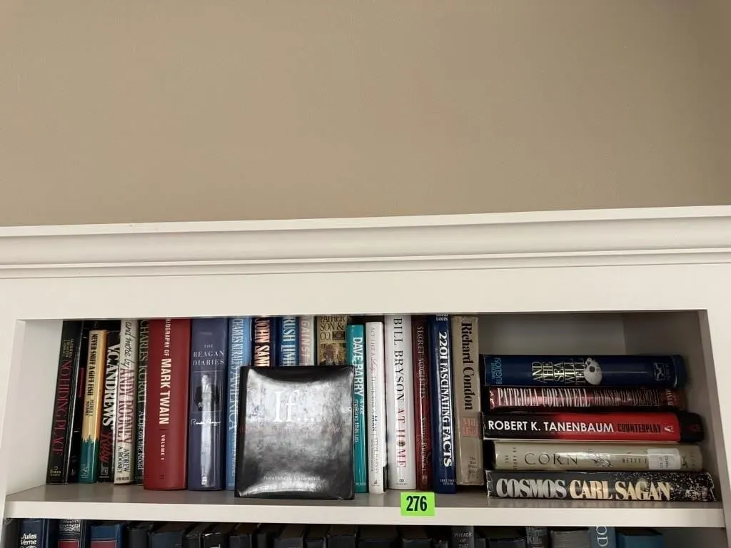 Shelf of hardback books