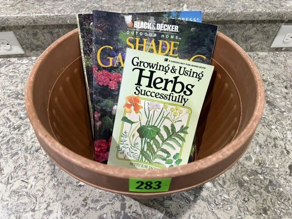 Plastic flower pot, gardening books