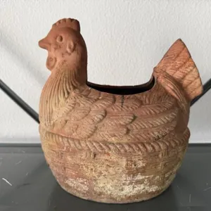 Clay chicken planter