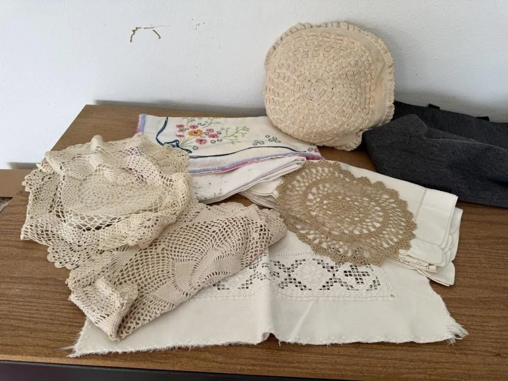 Tote of embroidery, crocheted doilies, pillow,