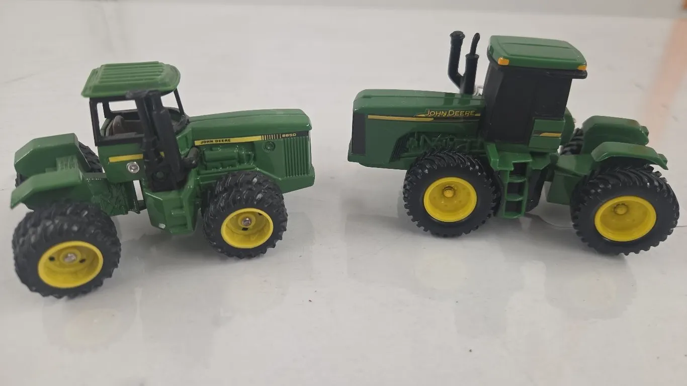 2 - 1/64 JD 4WD Tractors, 8850 & Plastic