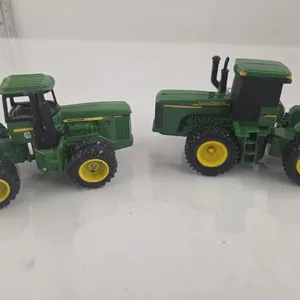 2 - 1/64 JD 4WD Tractors, 8850 & Plastic
