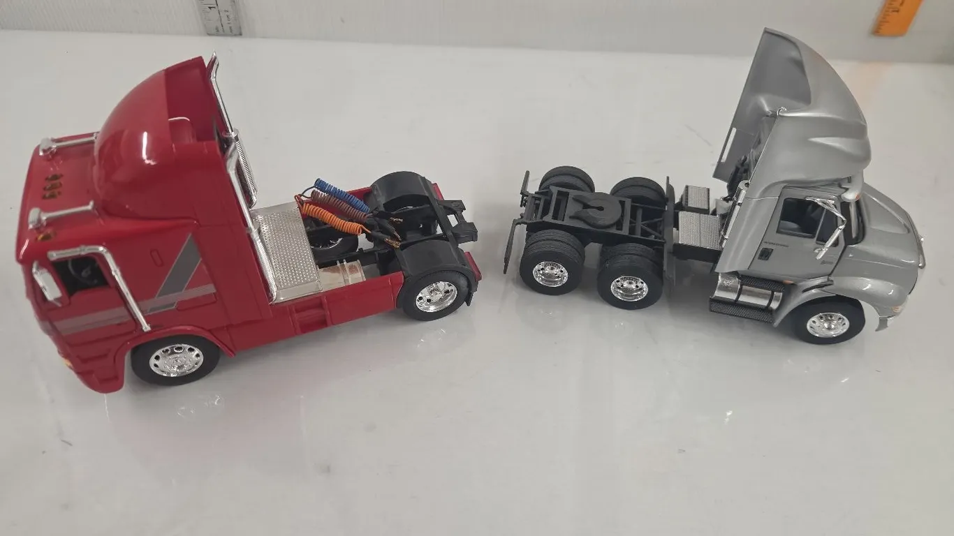 2 - 1/32 Semi Tractors, International 8600 & Freightliner COE w/ custom air lines added