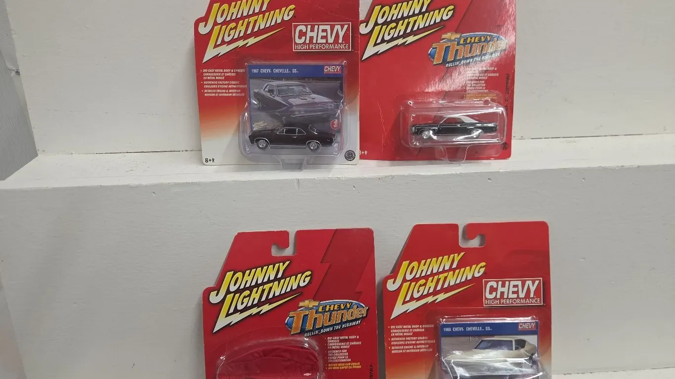 4 - 1/64 Johnny Lightning Cars - NIB