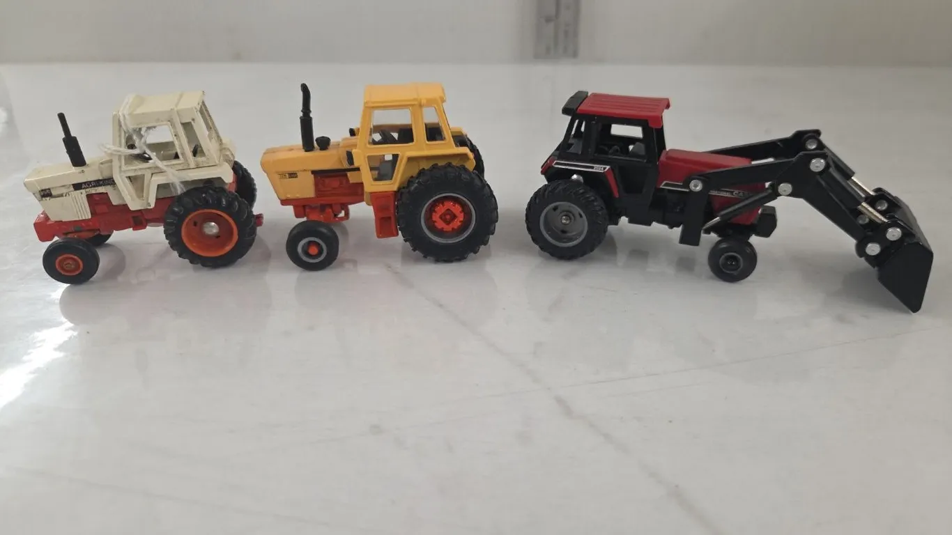 3 - 1/64 Case Tractors; 1370, 70 series & 2594 w/ loader