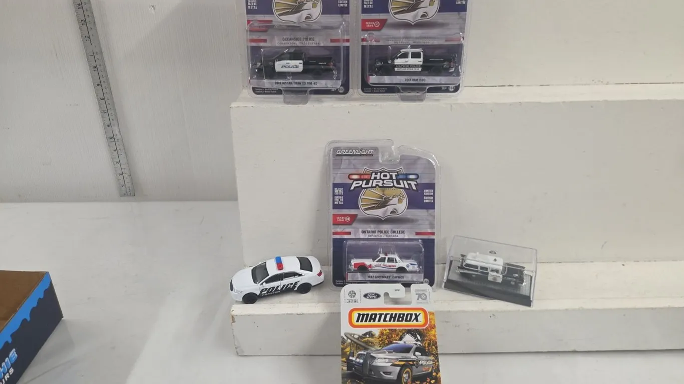 3 - 1/64 Greenlight Police Vehicles - 2016 Nissan Titan XD Pro-X, 2017 Ram 1500 & 1987 Chevrolet Caprice - NIB
