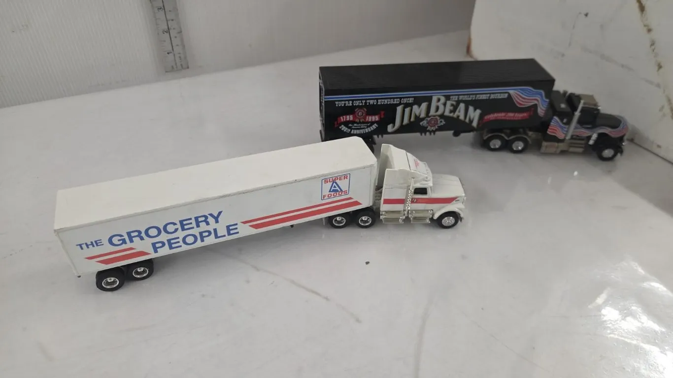 1/64 Kenworth 668 Semi & Trailer (Bigway Foods) & 1/58 Peterbilt Semi & Trailer (Jim Beam)