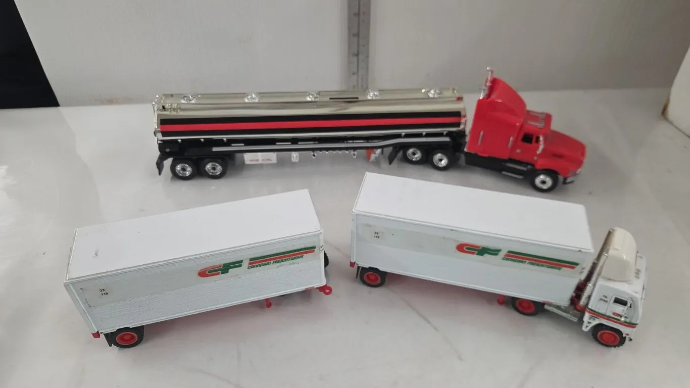 1/43 Ford AreoTrak Semi & Tanker Bank & 1/64 Canadian Freightways Semi & Trailers