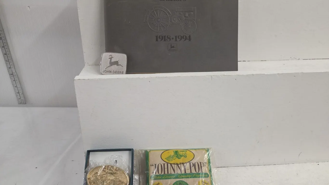 1996 JD Gold Level Certified Belt Buckle, JD belt buckle & JD Popcorn & 1994 JD Tractors Book
