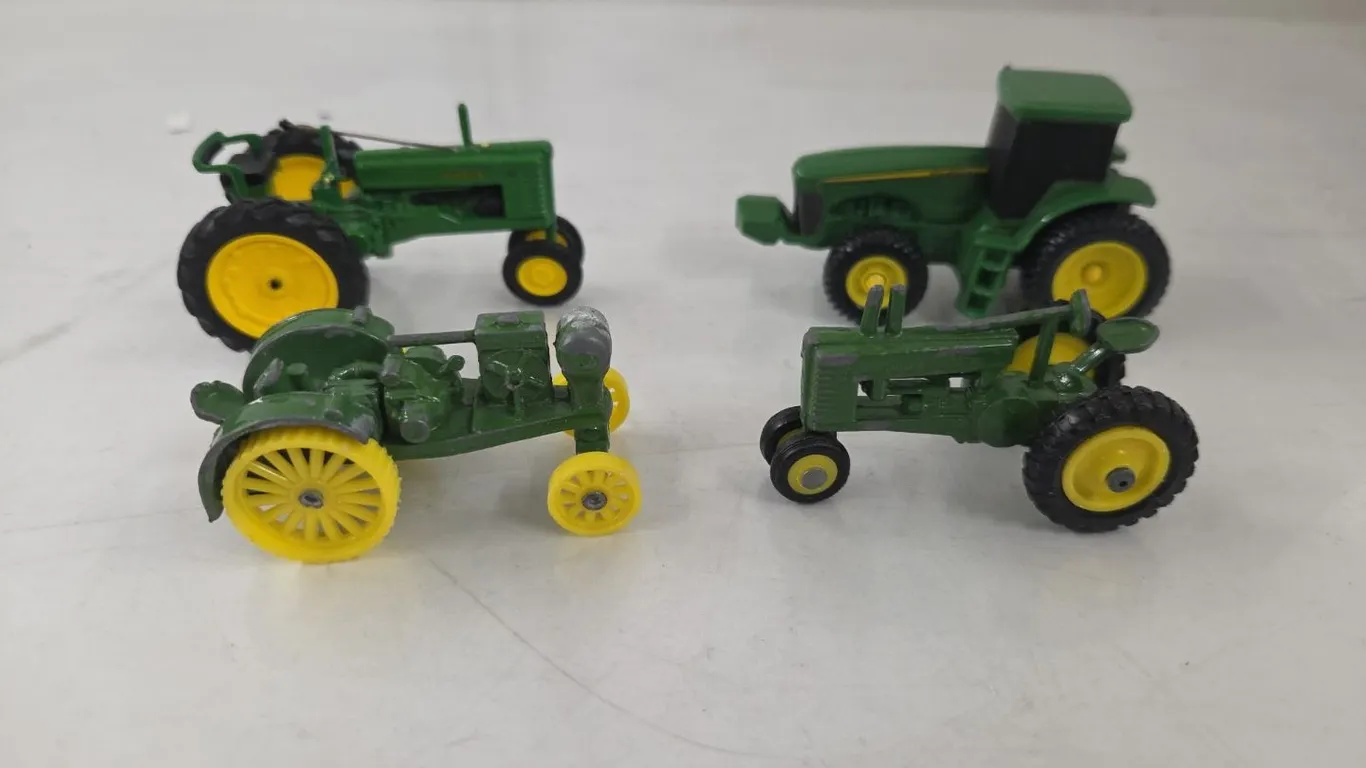 4 - 1/64 JD Tractors
