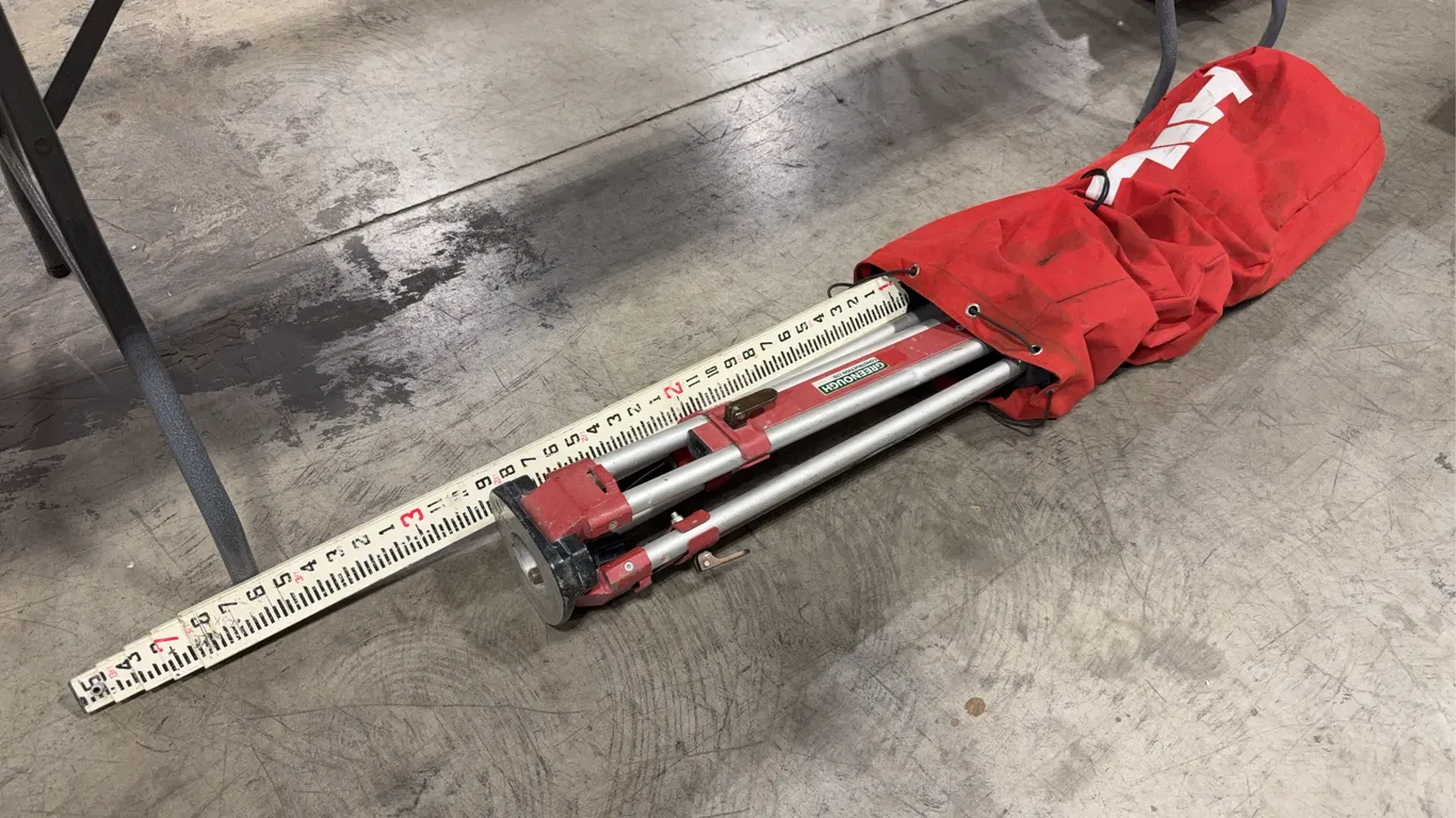 Lot of HILTI PUA 20 Tripod, Leveling Rod, and HILTI Storage Bag