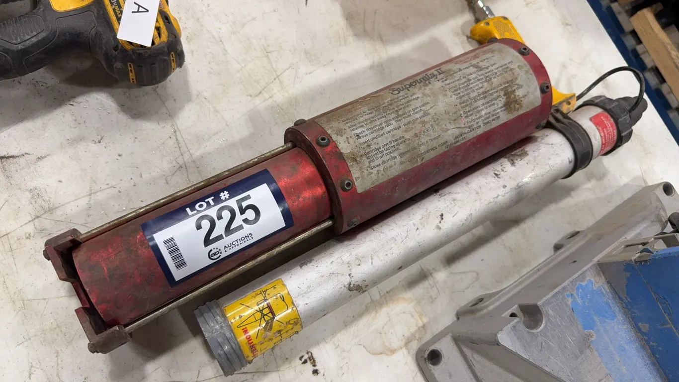 Lot of (1) SuperMixII and (1) Pneumatic Gun
