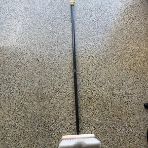 Wash brush, has hookup for hose on end