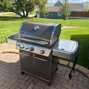 Weber Genesis grill, side burner, includes tank, excellent condition, this one sells new for over $1,100