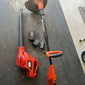 Cordless Grass Hog Black and Decker trimmer, blower, includes one battery, with charger