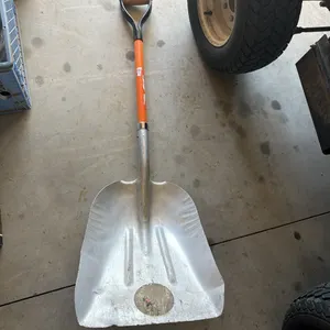 Scoop shovel with graphite handle