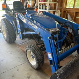 New Holland TC33D MFD Tractor, includes New Holland model 7308 loader with bucket, always garage kept, super clean, highly serviced and maintained, in