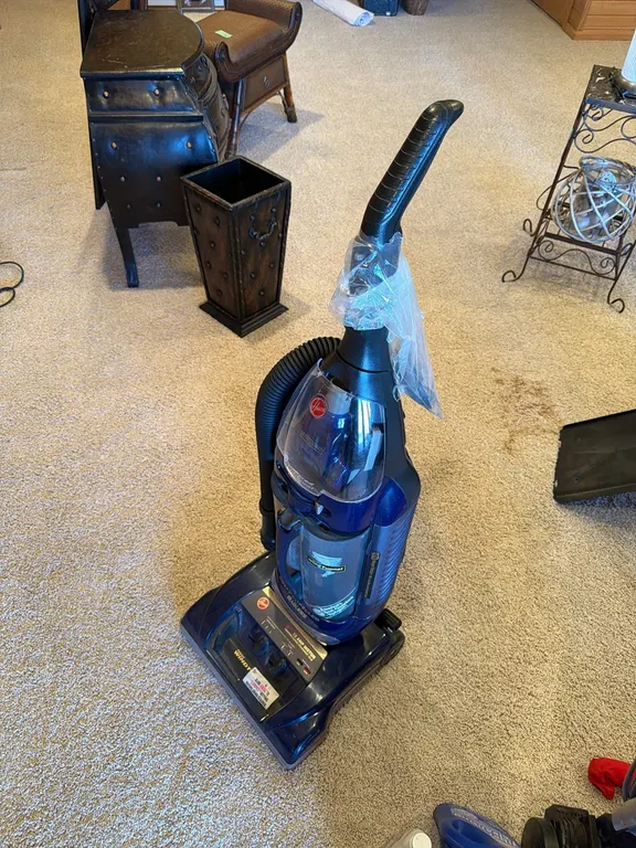 Hoover vacuum, has extra belt