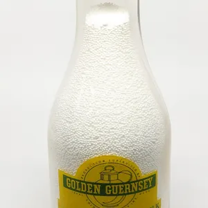 TRPQ 2 COLOR QUART MILK BOTTLE GOLDEN GUERNSEY JUDEVINE CREAMERY DOUGLAS WYOMING