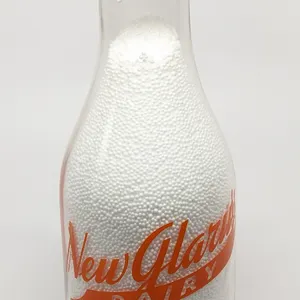 TRPQ QUART MILK BOTTLE NEW GLARUS WISCONSIN (COW)