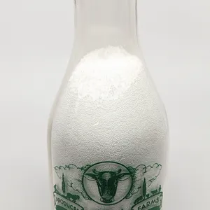 TRPQ QUART MILK BOTTLE MEGGERS DAIRY CLINTONVILLE WISCONSIN (COW & SOLDIER)