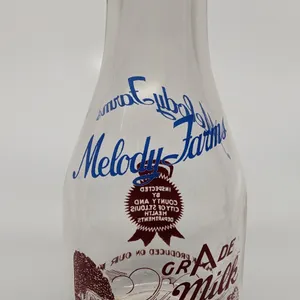 TRPQ 2 COLOR QUART MILK BOTTLE MELODY FARMS CHESTERFIELD MISSOURI