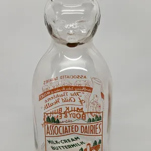 TRPQ 2 COLOR BABY FACE CREAM TOP MILK BOTTLE ASSOCIATED DAIRIES LOS ANGELES CALIFORNIA (COWS & BABY)