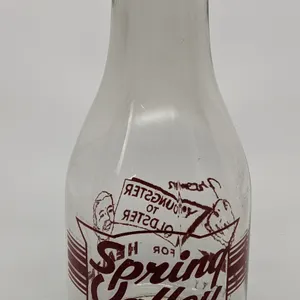 TRPQ QUART MILK BOTTLE SPRING VALLEY DAIRY COLORADO SPRINGS (BABY & GEEZER)