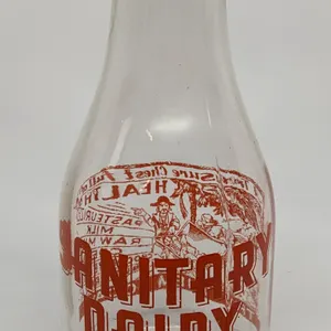 TRPQ QUART MILK BOTTLE SANITARY DAIRY NEILSVILLE WISCONSIN (PIRATE)