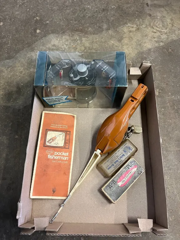 Vintage Pocket Fisherman and Real