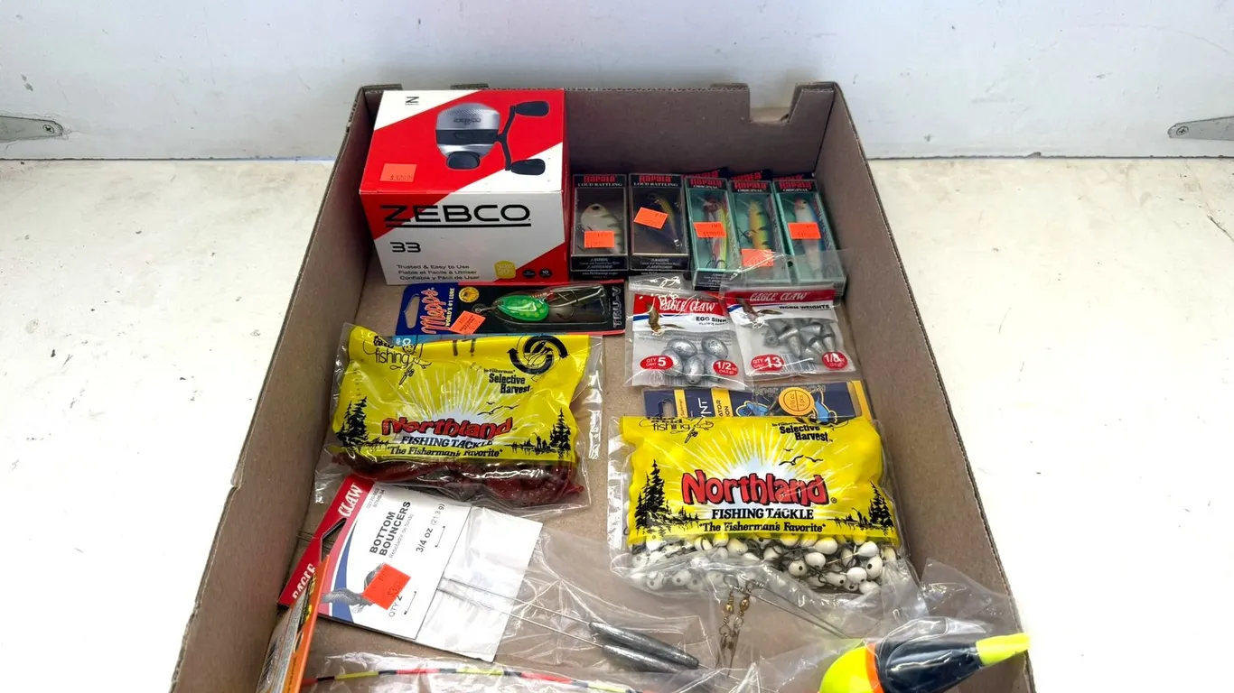 Reel and Assorted Fishing Supplies