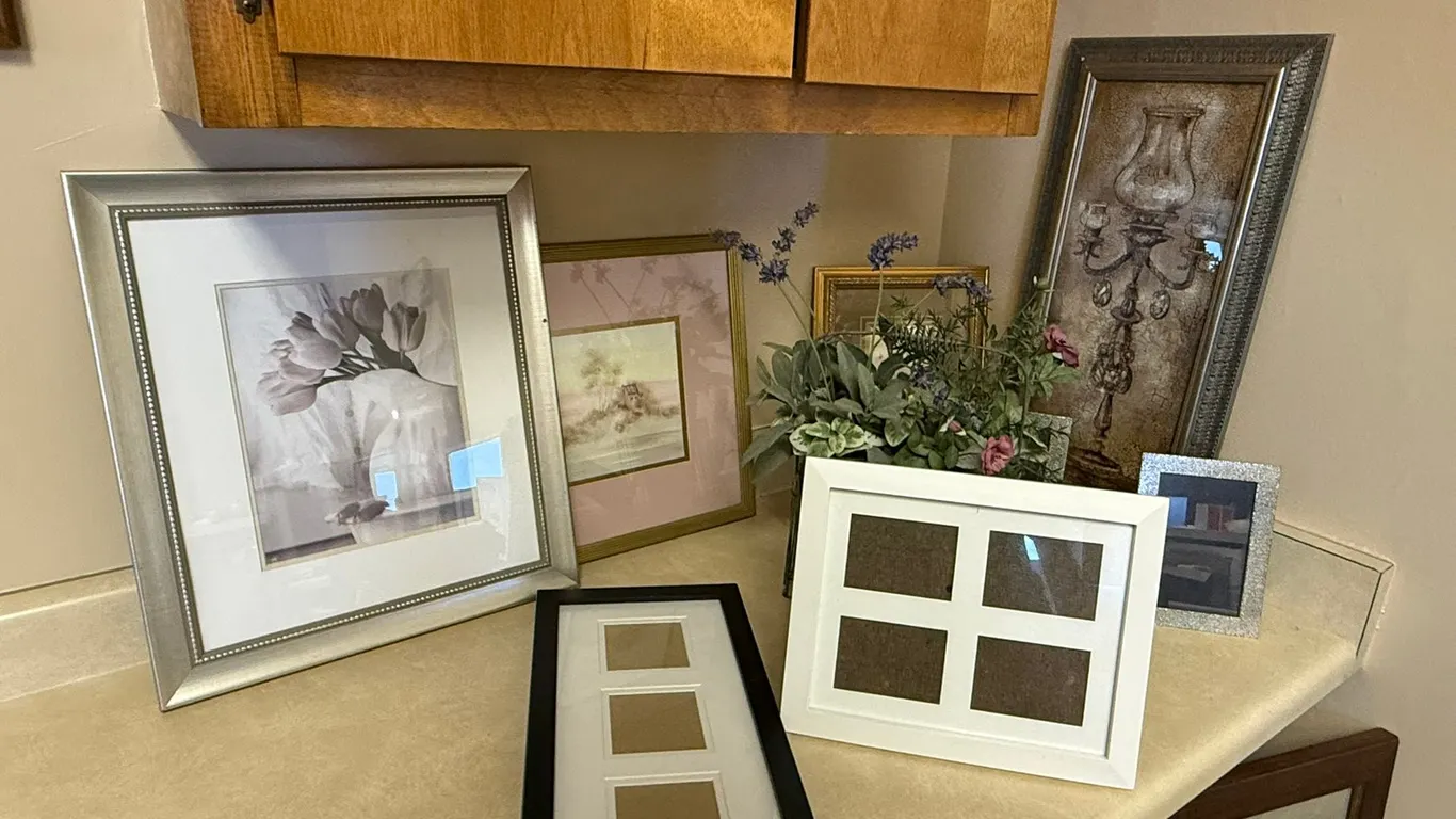 (9 Pictures Frames and Floral Arrangement