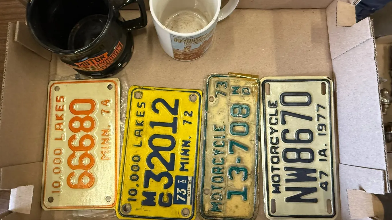 (4) Motorcycle License Plates and (2) Harley Davidson Coffee Cups
