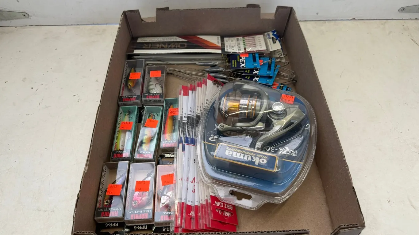 Reel and Assorted Fishing Supplies
