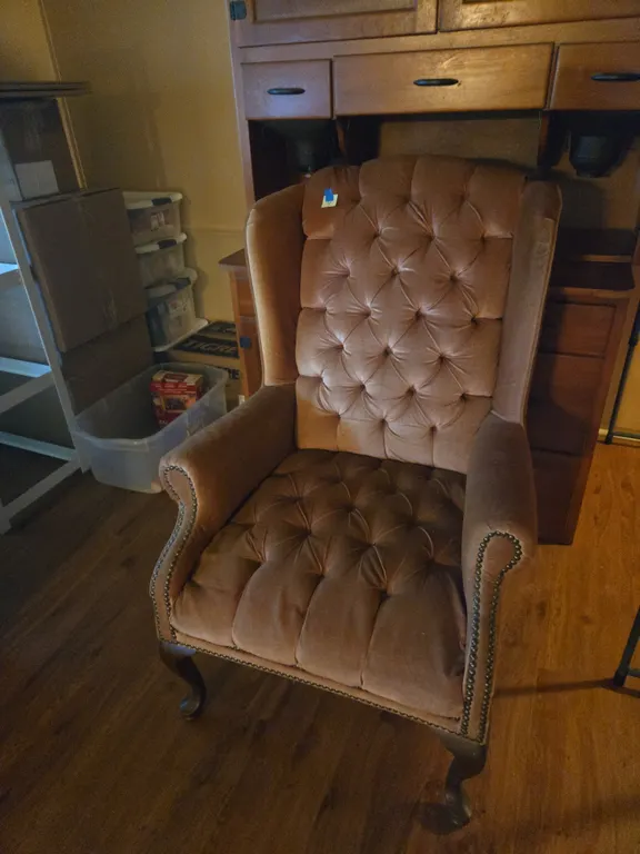 Upholstered wingback armchair
