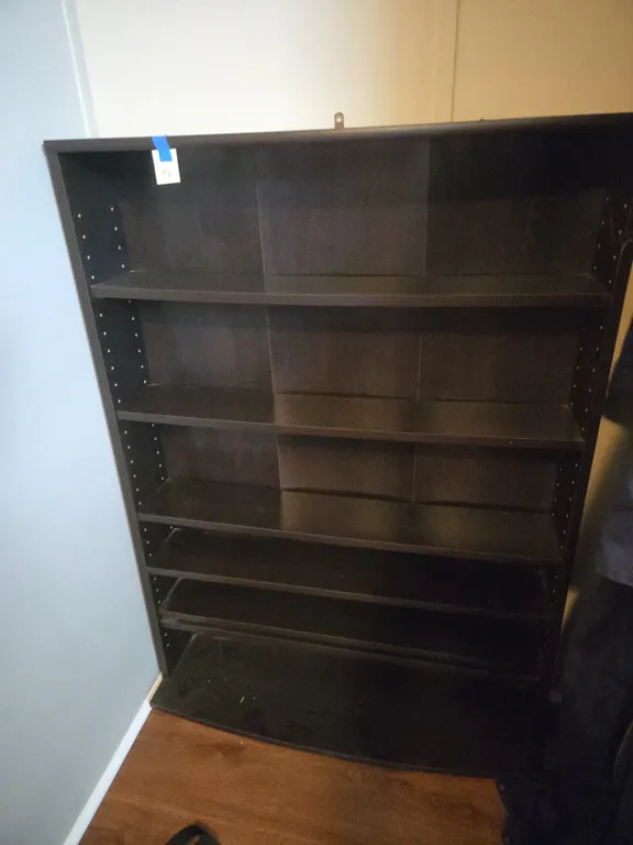 Small wooden shelving unit