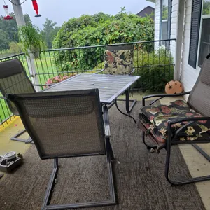 Steel patio table and four chair set