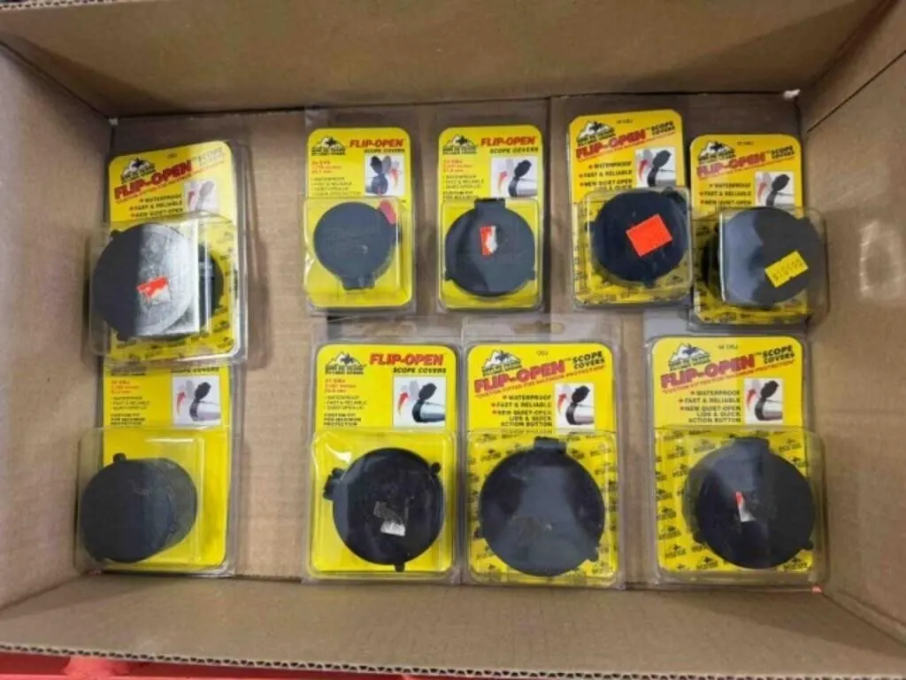 Box of assorted Butler Creek scope caps