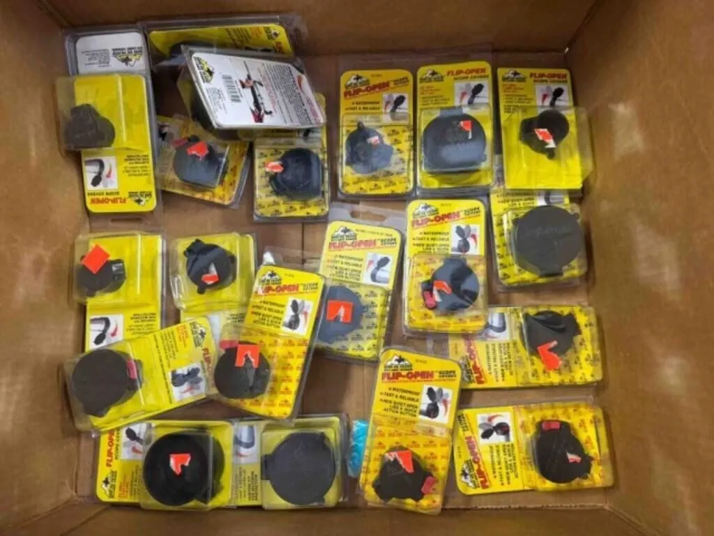 Box of assorted Butler Creek scope caps