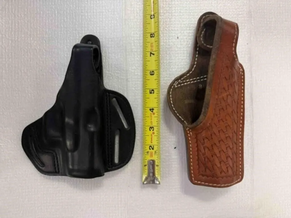 Box of pistol holsters and magazine holders