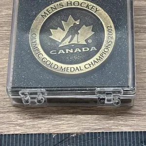 Men’s Hockey 2002 Solid Pewter Coin.