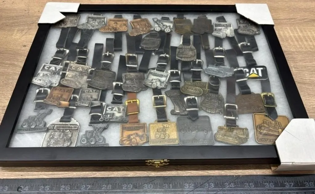 Display Case Of CAT Pocket Watch Fobs 16”x12”.