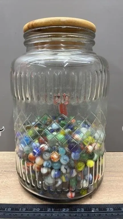Large Jar Of Marbles.
