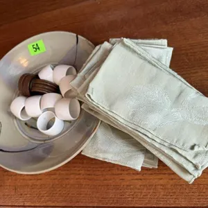 Pottery dish, cloth napkins, napkin rings