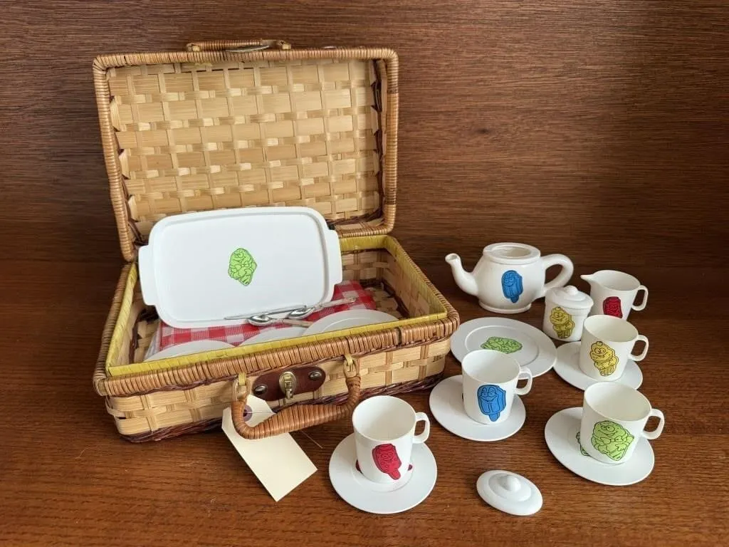 Picnic basket, toy tea set