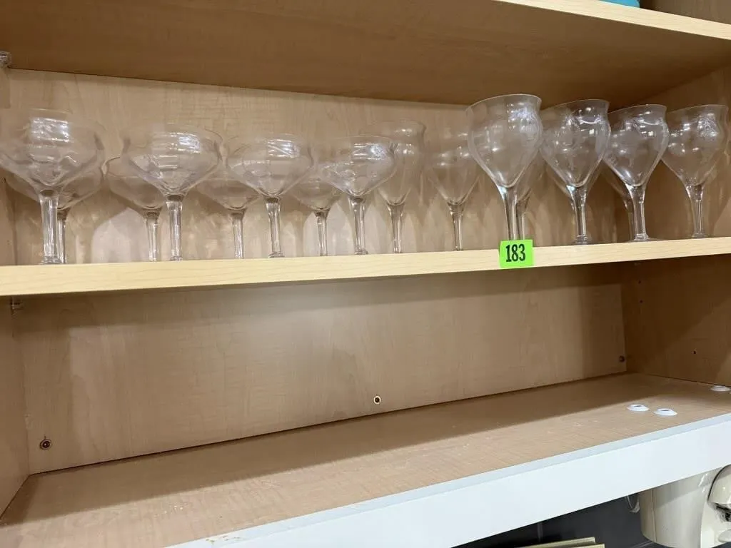 Shelf of etched stemware