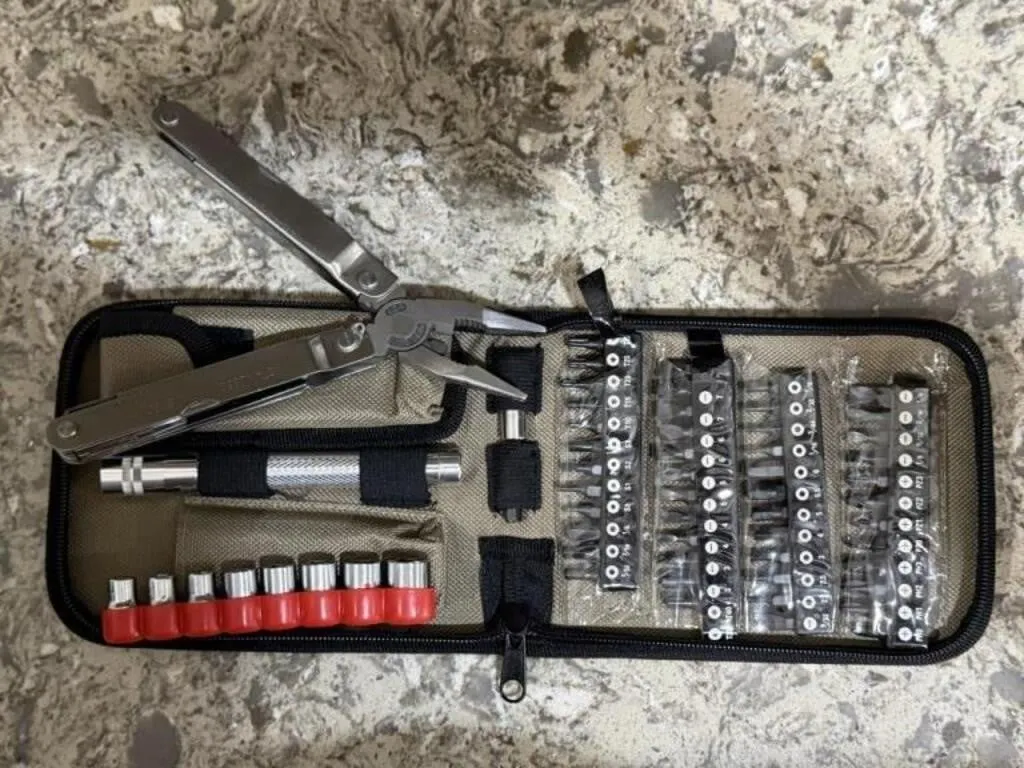 Portable tool kit, leatherman, drill bits