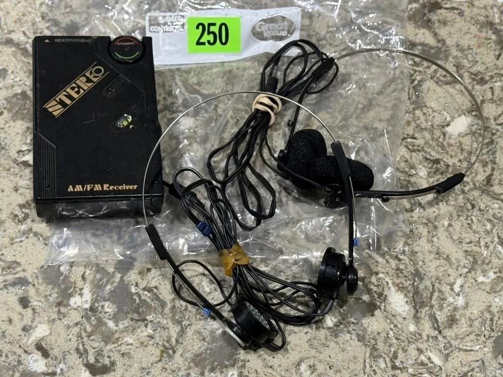 AM/FM stereo walkman, headphones (2)